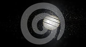 Raindrops blur bright street lamp at night