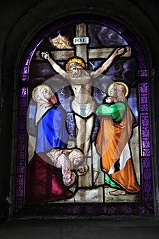 Stunning detail in stained glass windows, Notre Dame Cathedral, Paris, France, 2016