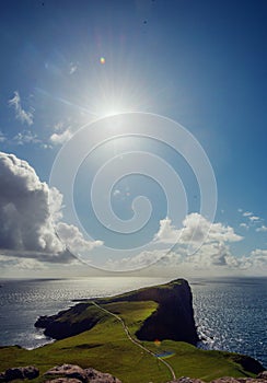 Stunning dusk cliff at Neist point lighthouse in Isle of Skye, Scotland, UK