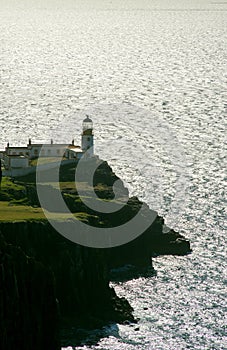 Stunning dusk cliff at Neist point lighthouse in Isle of Skye, Scotland, UK