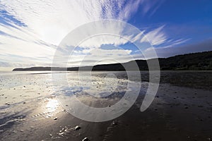 Stunning early morning beachscape and cloudscape from Red Wharf Bay, Isle of Anglesey, North Wales