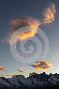 Stunning evening sunset view of the Mischabel Group, part of the Pennine Alps in Switzerland