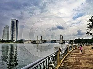 Stunning everning panorama view at lake side Taman Empangan Putrajaya. Walking path design for healty and active life concept photo