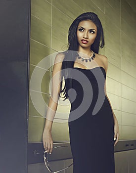 Stunning fashion model chic black dress photo