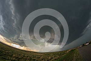 Stunning fisheye view of a rotating supercell thunderstorm over the plains of western Oklahoma, USA