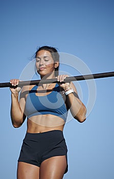 Stunning fitness model work out on track outside