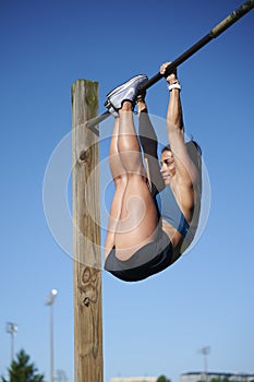 Stunning fitness model work out on track outside