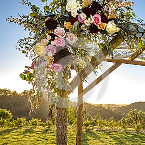 Stunning flowers on a Jewish wedding Chuppah