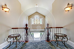 Stunning foyer with elegant staircase.