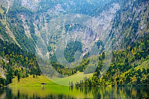 Stunning green waters of Obersee, located near Konigssee, known as Germany`s deepest and cleanest lake, situated in the extreme s