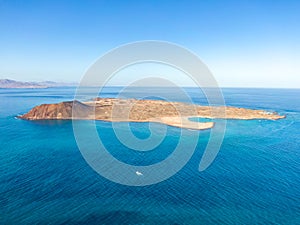 Stunning high angle panoramic aerial drone view of Isla de Lobos, a small uninhabited island near Fuerteventura