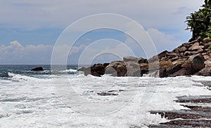 Stunning indian ocean waves at the beaches on the paradise island seychelles