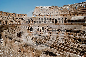 Stunning inside of the famous Colosseum, oval amphitheater in the center of the city of Rome, Italy