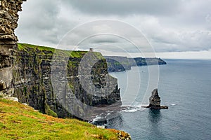 Stunning Irish landscape of the Cliffs of Moher and the Branaunmore sea stack