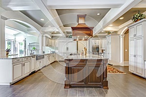 Stunning kitchen room design with large bar style island.
