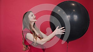 Stunning lady in red with air balloon says hello 30.