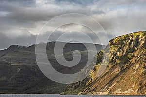 Stunning landscape image looking across Ennerdale Water in the English Lake District towards the peaks of Scoat Fell and Pillar photo