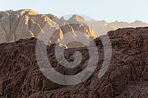 Stunning landscape of rocky peaks against a blue sky. Mount Sinai Mount Horeb, Gabal Musa. Sinai Peninsula of Egypt photo