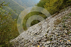 Pretty landscape on a steep hill with a rocky ground photo