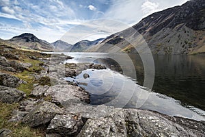 Stunning landscape of Wast Water with reflections in calm lake w