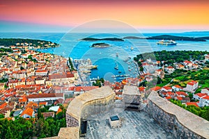 Stunning medieval Hvar town with spectacular harbor at sunset, Croatia