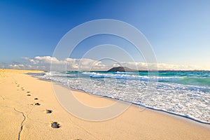 Stunning morning view of the islands of Lobos and Lanzarote seen from Corralejo Beach Grandes Playas de Corralejo on Fuerteventu photo