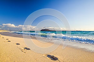 Stunning morning view of the islands of Lobos and Lanzarote seen from Corralejo Beach Grandes Playas de Corralejo on Fuerteventu photo