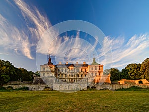 Stunning morning view of medieval Pidhirtsi Castle illuminated by rising sun, Pidhirtsi village, Lviv region, Ukraine