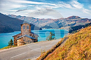 Stunning morning view of Roselend lake Lac de Roselend. Splendid autumn scene of Auvergne-Rhone-Alpes, France, Europe. Beauty of