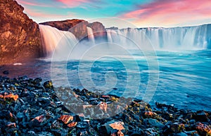 Stunning morning view of Skjalfandafljot river, Iceland, Europe. Picturesque summer scene of Godafoss, spectacular waterfall plung