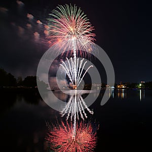 AI-Generated Image: Fireworks Over a Lake with Reflection