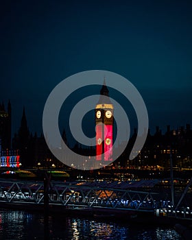 Stunning nighttime shot of London's iconic Big Ben clock tower from Parliament Square, England