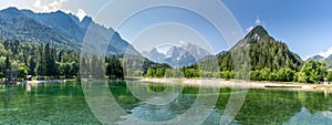 Stunning panorama view over Lake Jasna, Kranjska Gora, Slovenia, with the Alps in the background