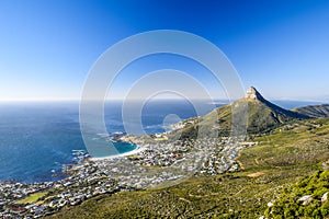 Stunning panorama view of the suburb of Camps Bay and Lion`s Head mountain in Cape Town