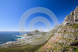 Stunning panorama view of the suburb of Camps Bay and Lion`s Head and Table mountain