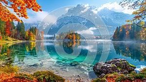 Stunning panoramic autumnal vista of Hintersee Lake with vibrant hues, framed by the majestic Bavarian Alps along the Austrian