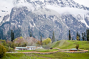 Stunning photograph of Kashmir valley Paradise on Earth. Beautiful view of Betaab Valley surrounded by snow frozen Himalayas