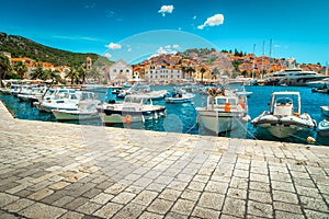 Stunning promenade and harbor with luxury yachts, boats, Hvar, Croatia