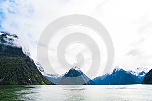 A stunning scene of nature with snow mountain and ford land at Milford Sound, New Zealand. I