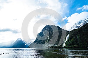 A stunning scene of nature with snow mountain and ford land at Milford Sound, New Zealand. I