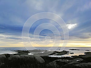 Beautiful norwegian landscape during cold winter evening. Sunset by the fiords. photo