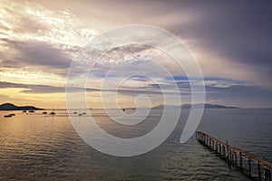 Stunning scenery sunset on Samui island, Thailand. Wooden pier i