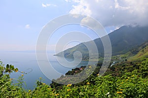 Stunning scenery of volcanic lake Toba - largest and deepest crater lake in the world located in North Sumatra, Indonesia