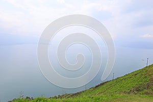 Stunning scenery of volcanic lake Toba - largest and deepest crater lake in the world located in North Sumatra, Indonesia