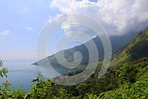 Stunning scenery of volcanic lake Toba - largest and deepest crater lake in the world located in North Sumatra, Indonesia