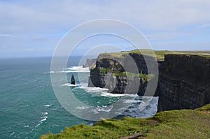 Stunning seascape of the galway bay and the Cliffs of Moher photo