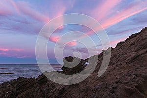 Stunning shot of a beautiful skyscape from a sea coast in Malibu, Califonia photo