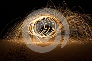 Stunning steel wool photography. Spinning sparks pattern.