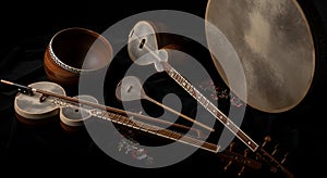 Traditional string and drum instruments displayed