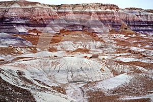 Stunning striped purple sandstone formations of Blue Mesa badlands in Petrified Forest National Park